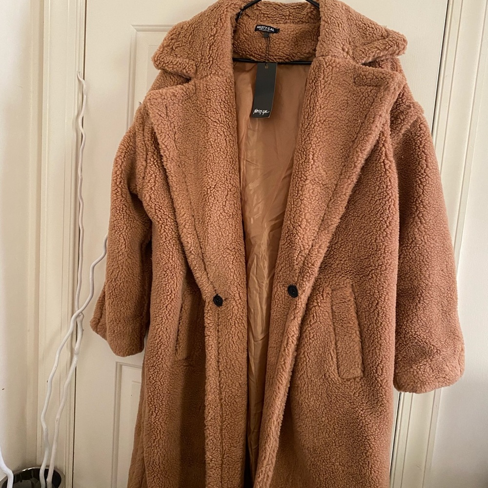 Tan teddy coat.